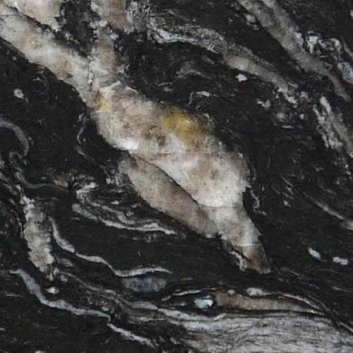 Close-up of a dark, marbled surface with swirling patterns of light and dark grey, white, and hints of yellow.